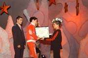 Tom Morley getting the special prize from Dino